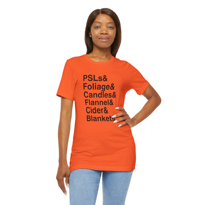 Fall Essentials Shirt: PSLs, Foliage, Candles, Flannel, Cider, Blankets, Perfect Cute Autumn Gift for Cozy Pumpkin Spice Season Enthusiasts